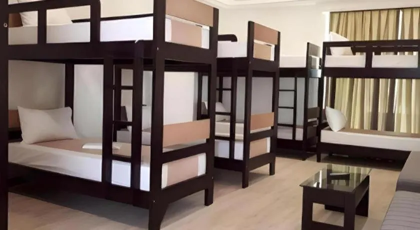 Bed in Anilao Awari Bay Resort