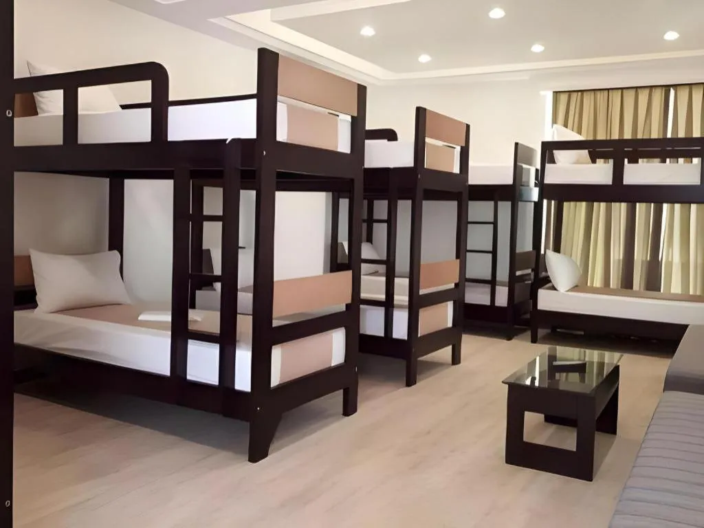 Bed in Anilao Awari Bay Resort