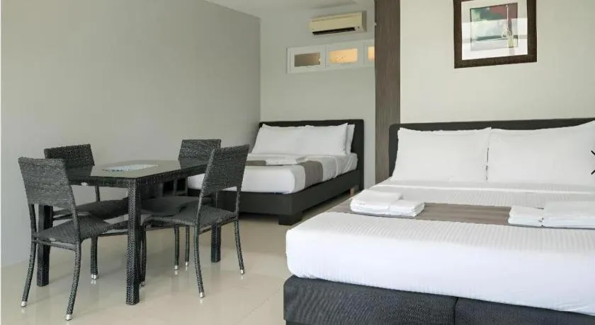 Bed in Anilao Awari Bay Resort