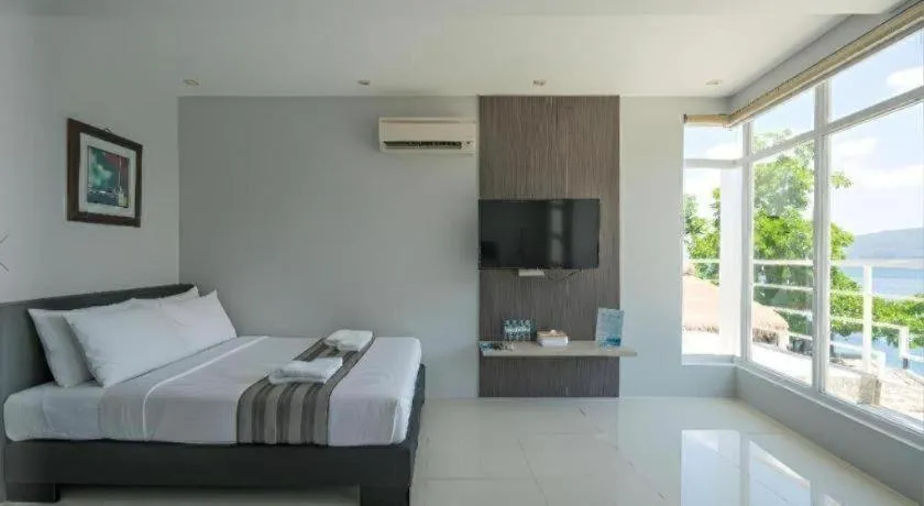 Bed in Anilao Awari Bay Resort