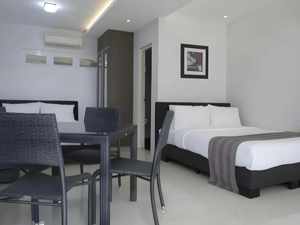 Bed in Anilao Awari Bay Resort