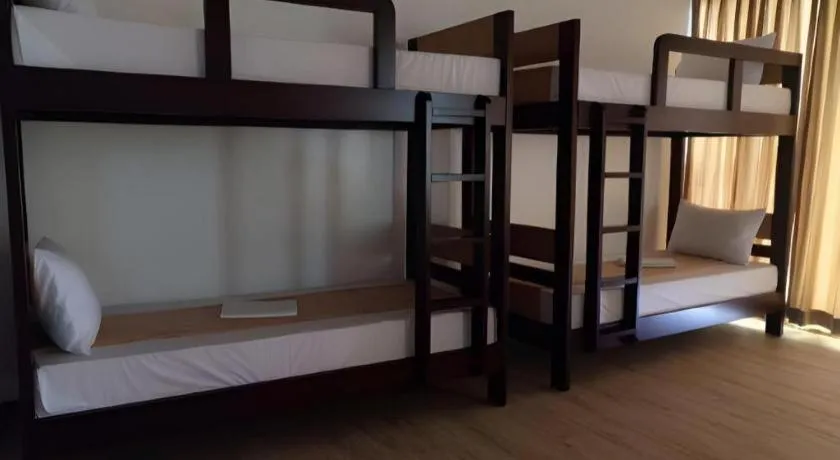 Bed in Anilao Awari Bay Resort