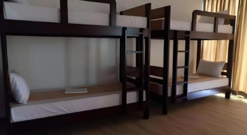 Bed in Anilao Awari Bay Resort