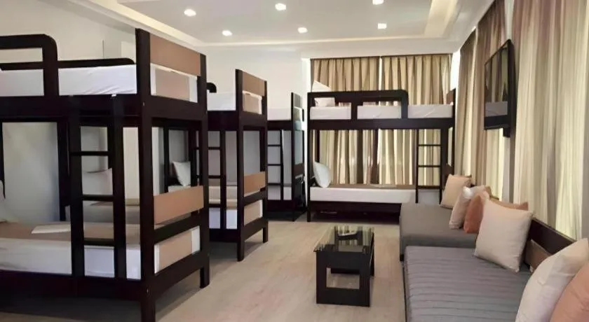 Bed in Anilao Awari Bay Resort