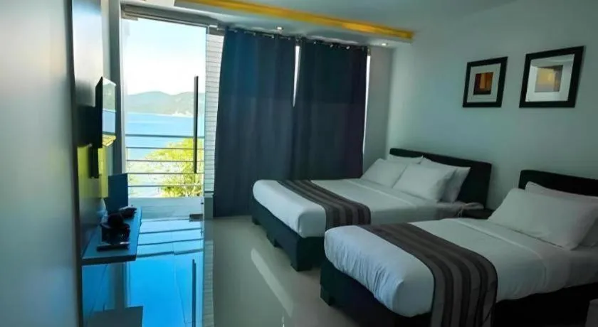 Bed in Anilao Awari Bay Resort