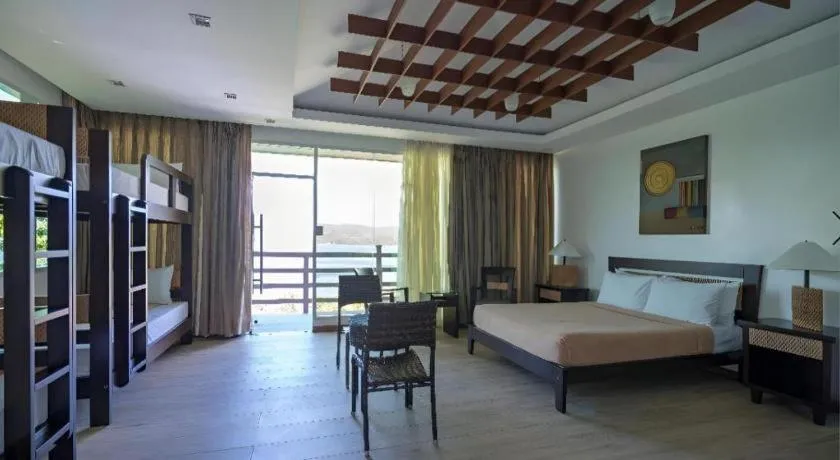 Bed in Anilao Awari Bay Resort