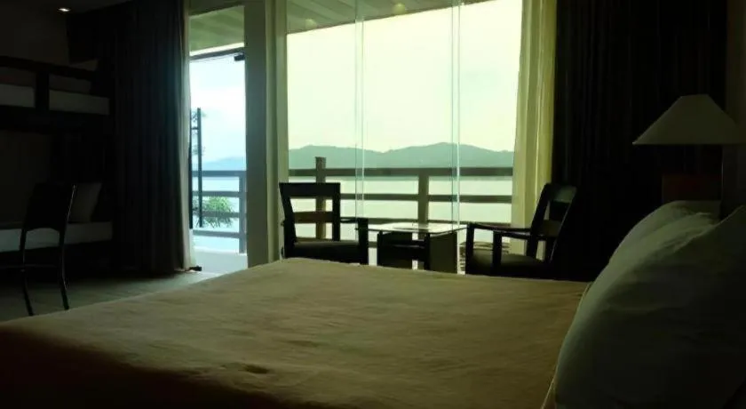 Bed in Anilao Awari Bay Resort
