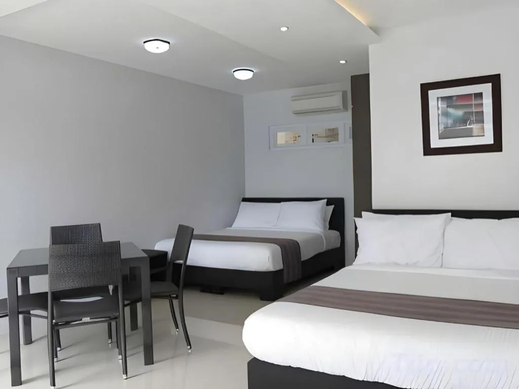 Bed in Anilao Awari Bay Resort