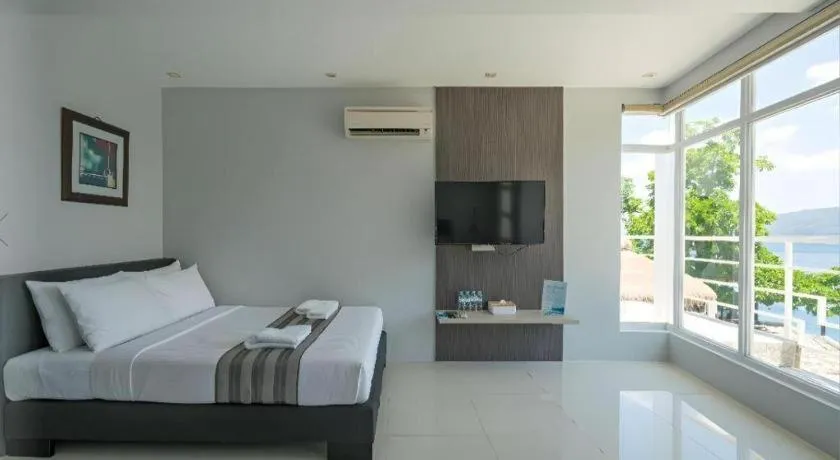 Bed in Anilao Awari Bay Resort