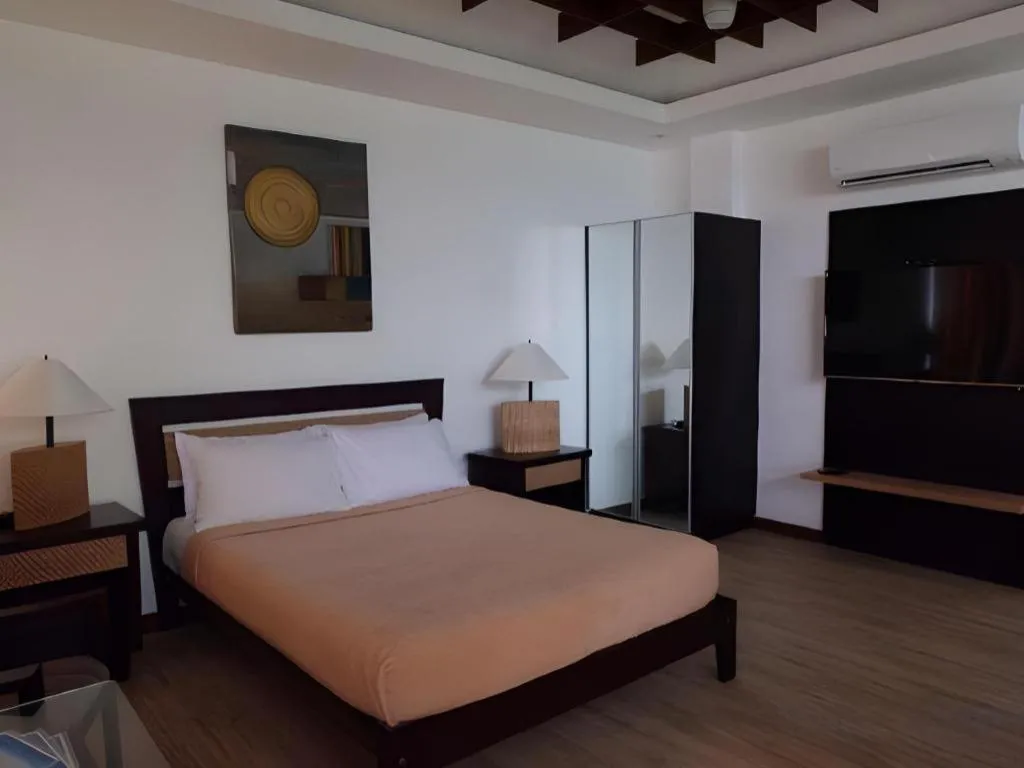 Bed in Anilao Awari Bay Resort