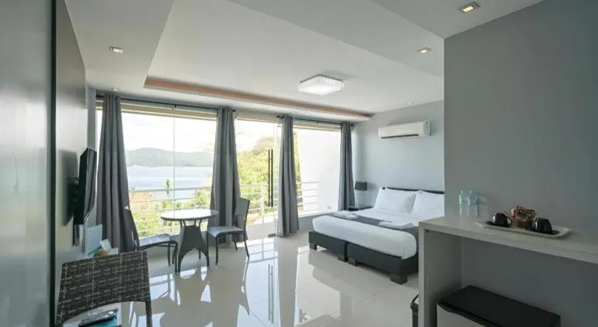 Bed in Anilao Awari Bay Resort