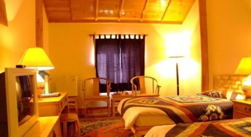 Bed in The Silk Road Dunhuang Hotel