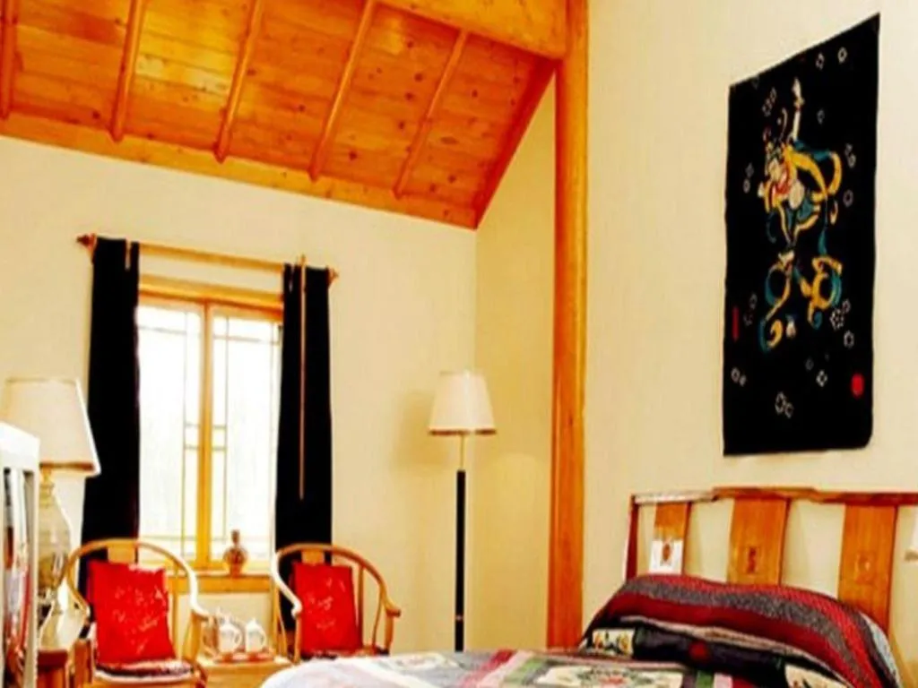 Bed in The Silk Road Dunhuang Hotel