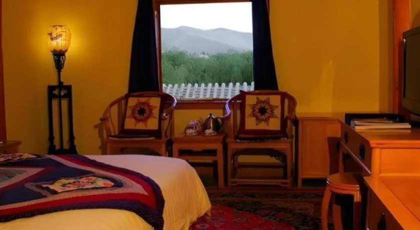 Bed in The Silk Road Dunhuang Hotel