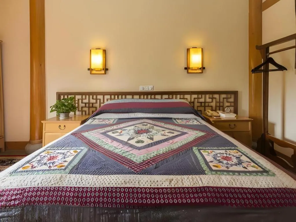 Bed in The Silk Road Dunhuang Hotel