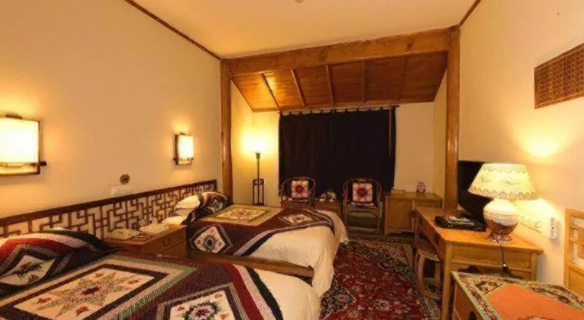 Bed in The Silk Road Dunhuang Hotel