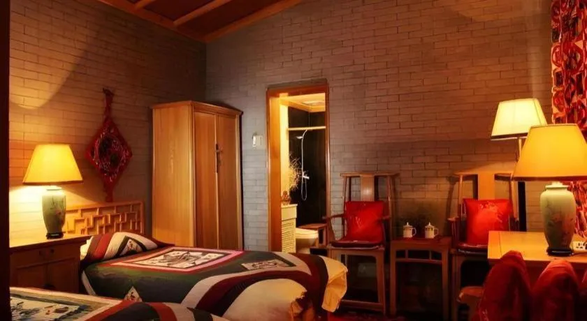 Bed in The Silk Road Dunhuang Hotel