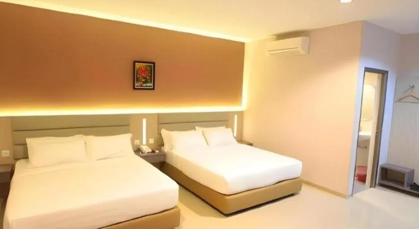 Bed in Lovina Inn Hotel Batam