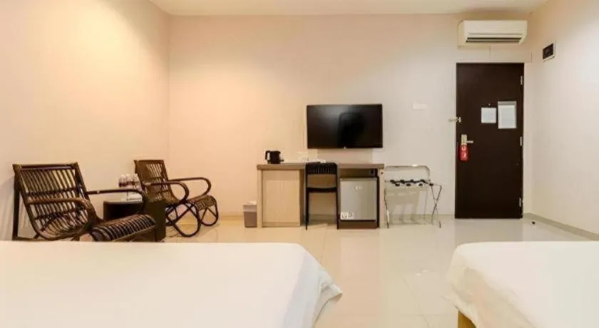 Bed in Lovina Inn Hotel Batam