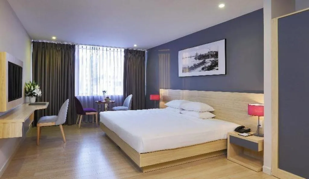 Bed in Lavender Boutique Hotel