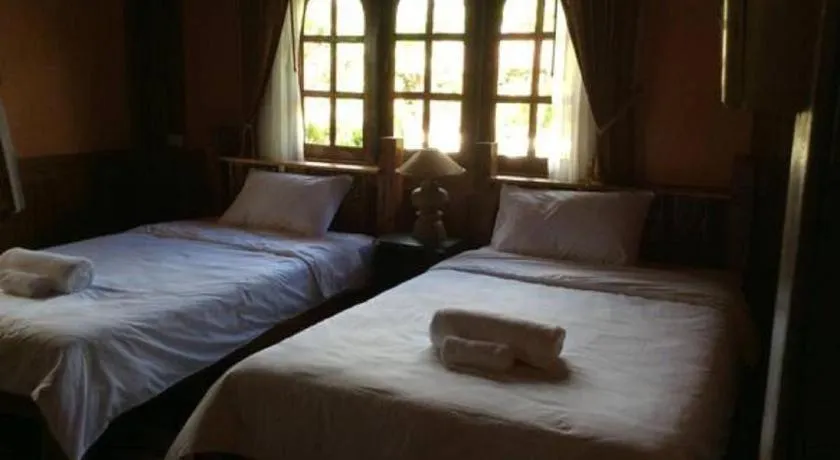 Bed in Himawari Restaurant and Cottage