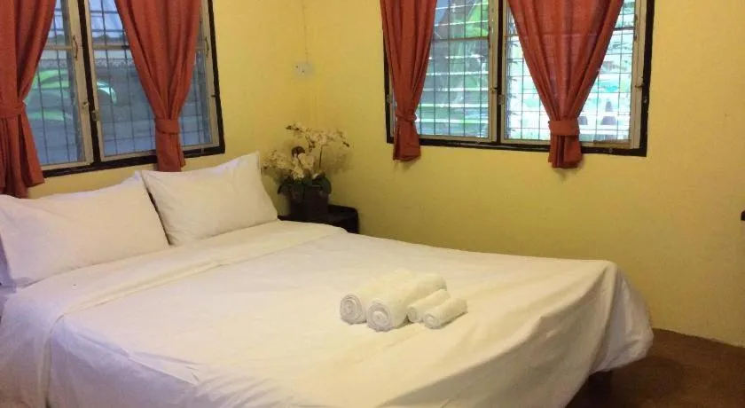 Bed in Himawari Restaurant and Cottage