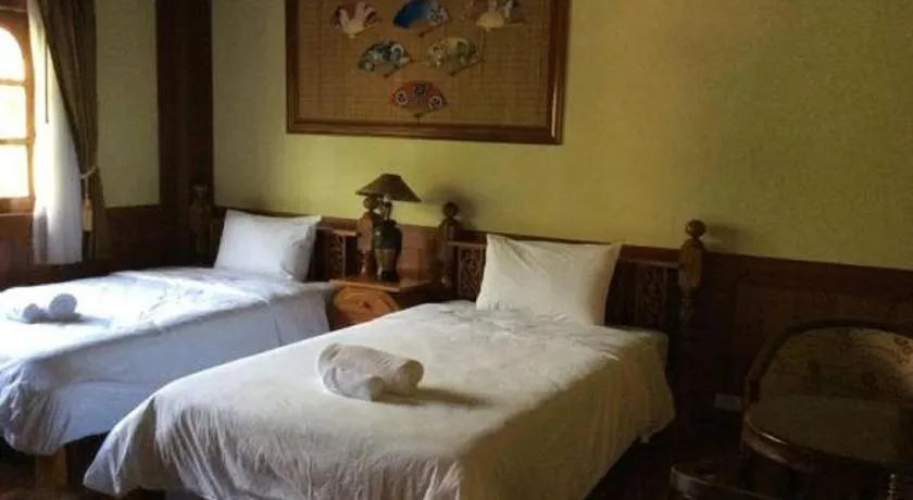 Bed in Himawari Restaurant and Cottage