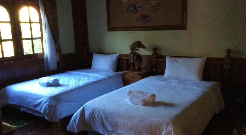 Bed in Himawari Restaurant and Cottage