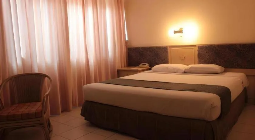 Bed in Hotel Griyadi Kusuma Sahid