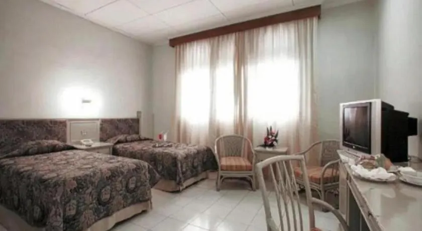 Bed in Hotel Griyadi Kusuma Sahid