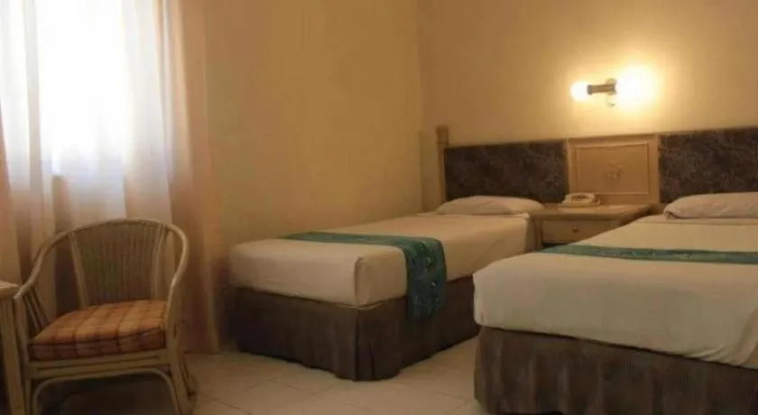 Bed in Hotel Griyadi Kusuma Sahid