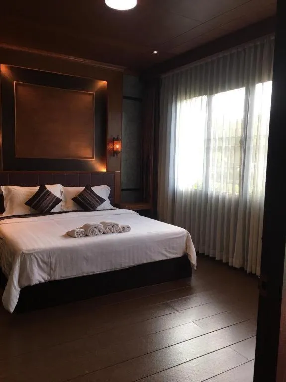 Bed in Hongfu Boutique Resort
