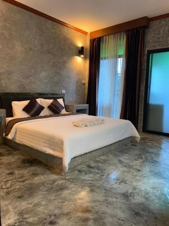 Bed in Hongfu Boutique Resort