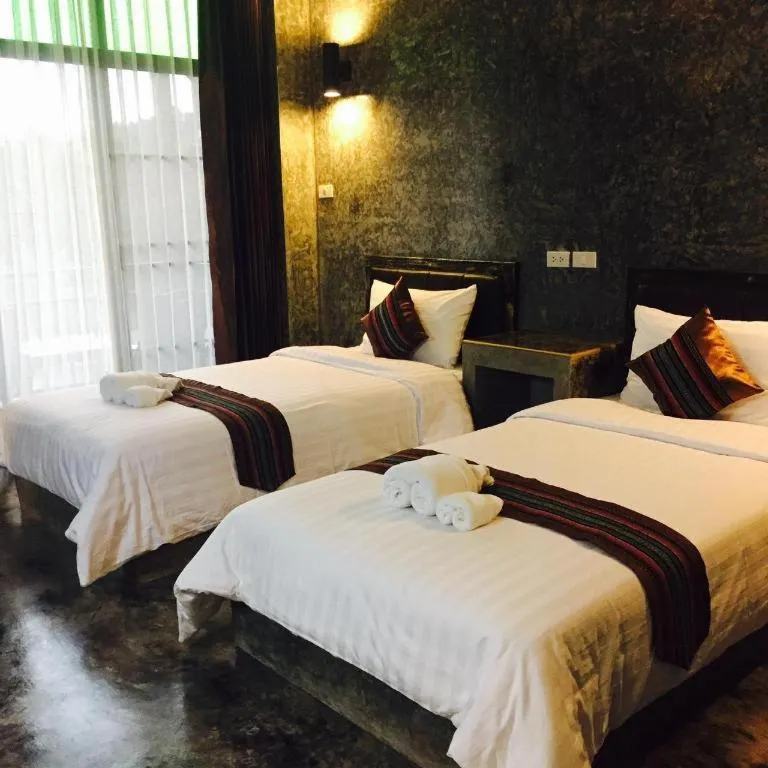 Bed in Hongfu Boutique Resort