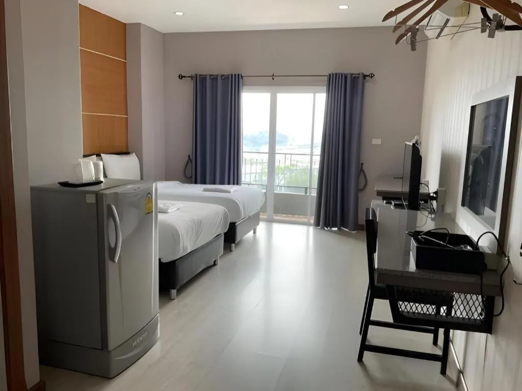 Bed in The Y Residence