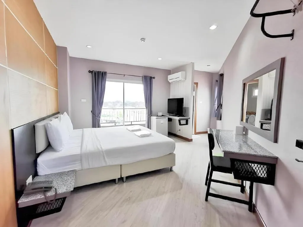 Bed in The Y Residence