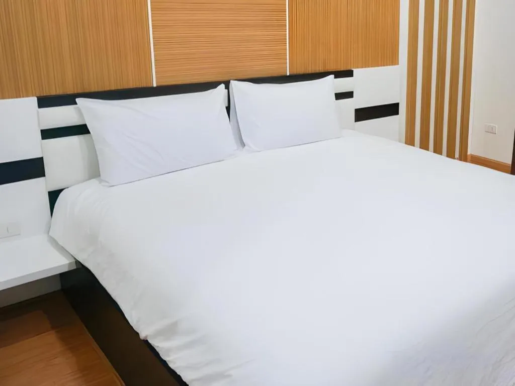 Bed in The Y Residence