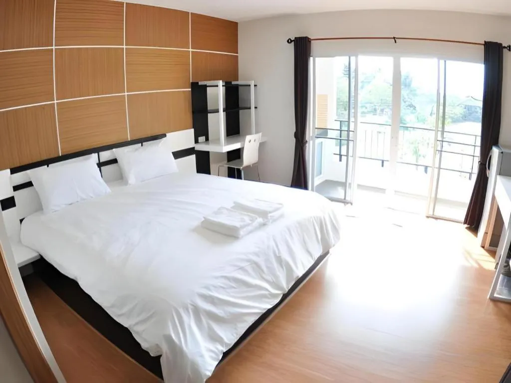 Bed in The Y Residence