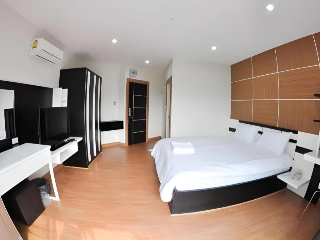 Bed in The Y Residence