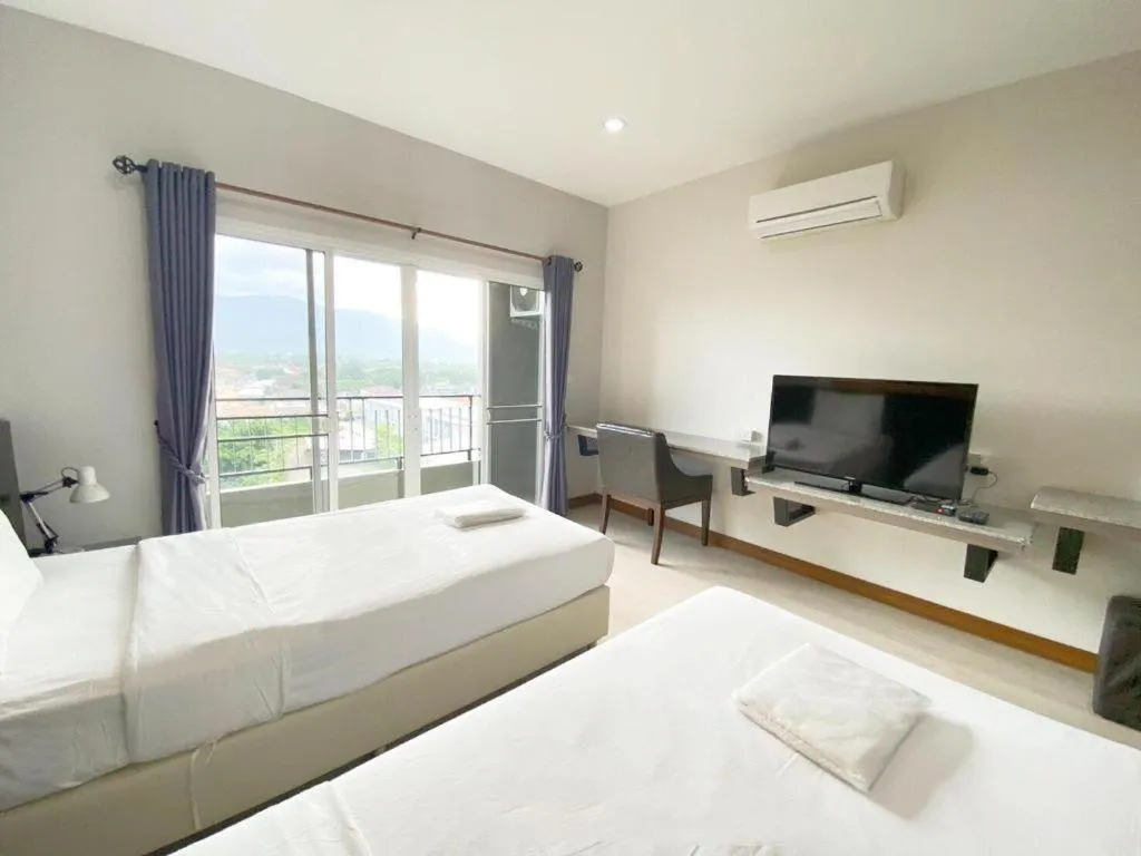 Bed in The Y Residence