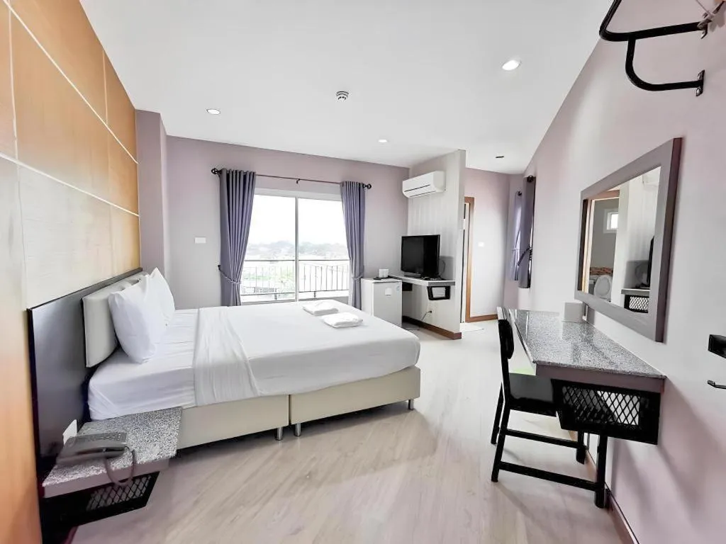 Bed in The Y Residence