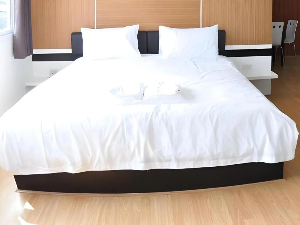 Bed in The Y Residence