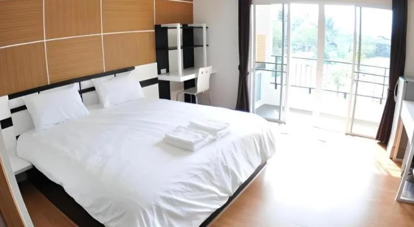 Bed in The Y Residence