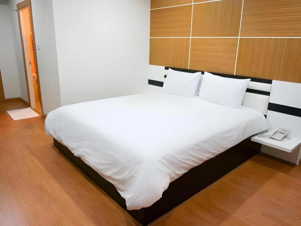 Bed in The Y Residence