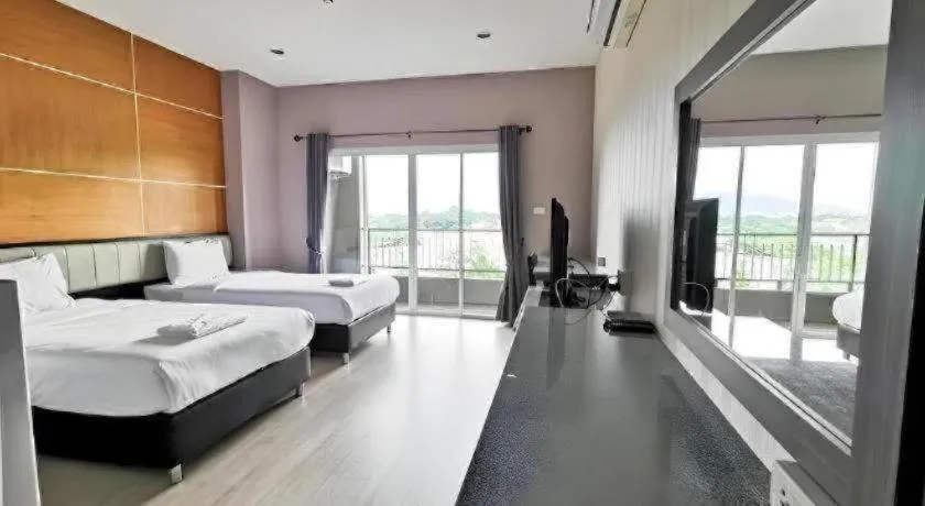 Bed in The Y Residence