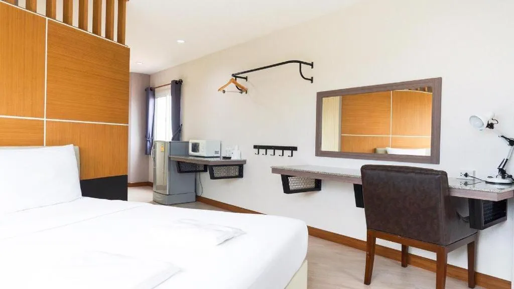 Bed in The Y Residence