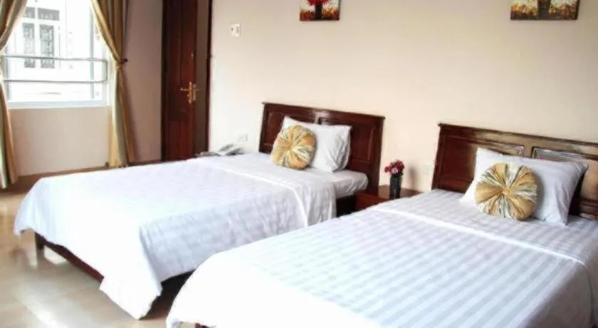 Bed in Huong Binh Hotel