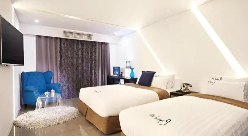 Bed in Hotel Boutique 9