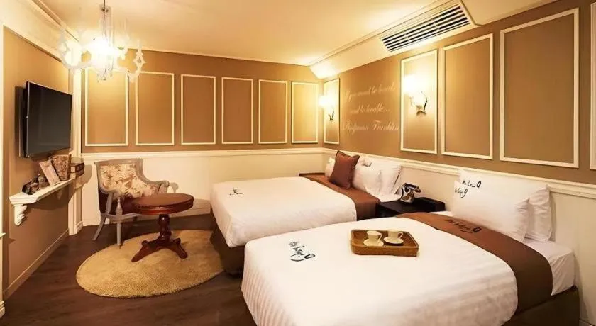 Bed in Hotel Boutique 9