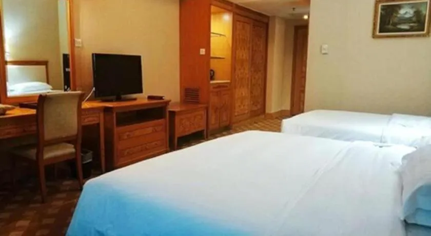 Bed in Zhuhai Dehan Hotel